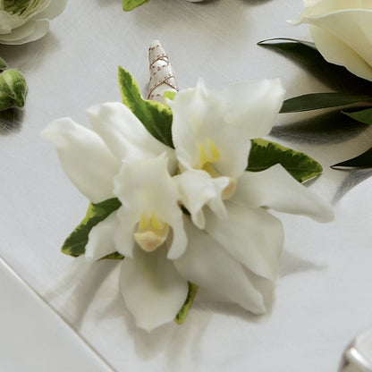 White Mini Cymbidium Boutonniere – CHARLY'S FLOWERS, San Jose CA